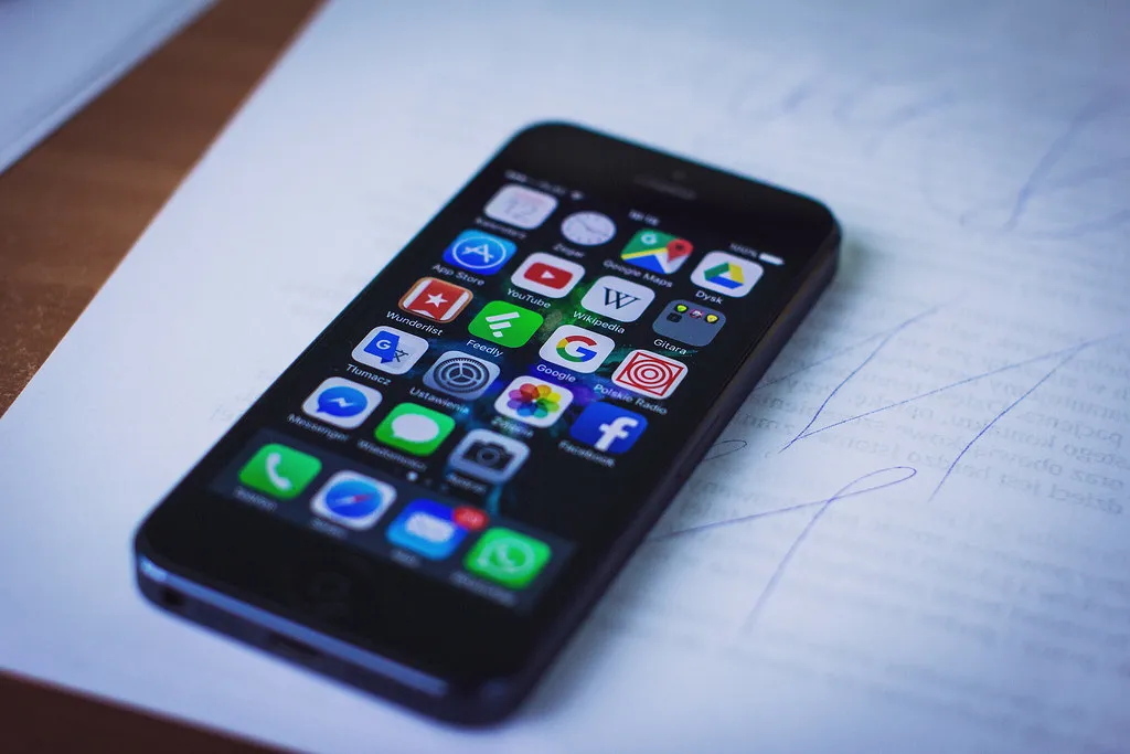 An iPhone home screen showing a grid of app icons